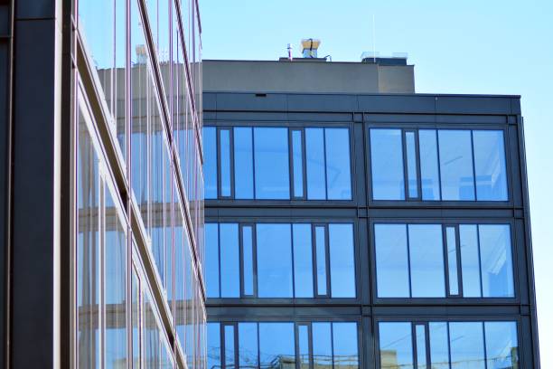 istock Glass curtain wall of modern office building 1037357510