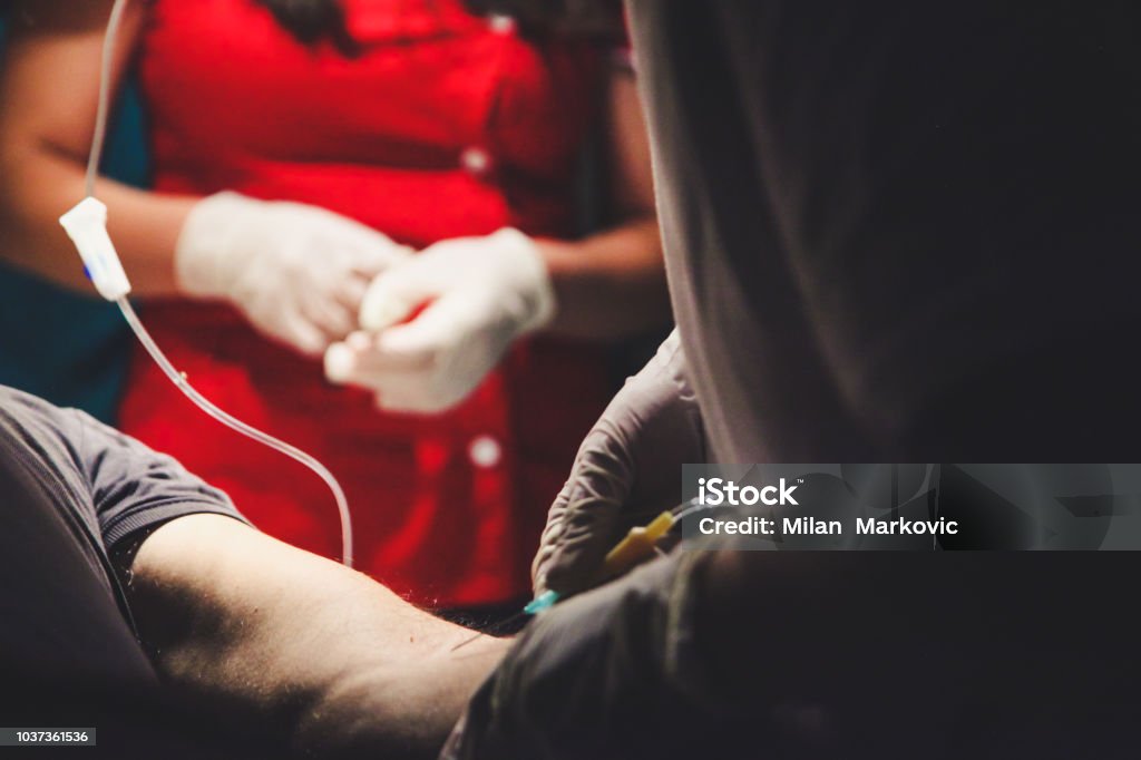 Paramedic team Patient, Adult, Adults Only, Medical Exam, Mid Adult A Helping Hand Stock Photo