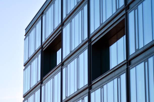 istock Glass curtain wall of modern office building 1037362906