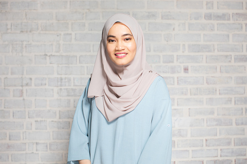 Portraits, Facial Expression, Malaysian Ethnicity, Headshots - Young woman in a hijab