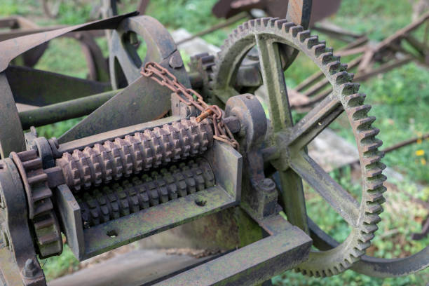 istock Old rusty gears. Gear wheels in agricultural equipment. 1037370058