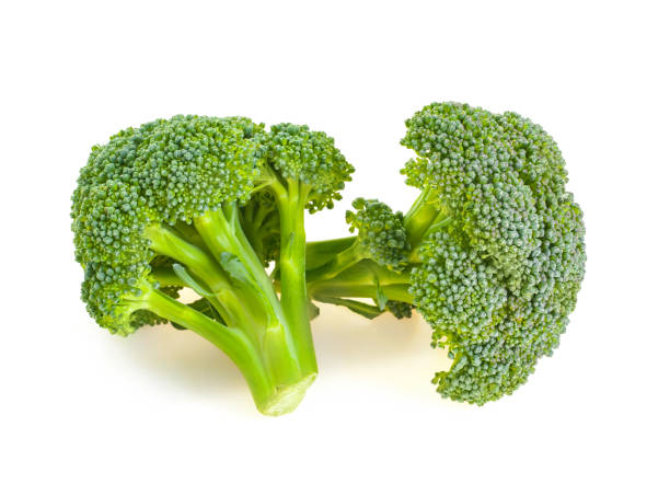 raw broccoli isolated on white background. raw broccoli isolated on white background. broccoli crowns stock pictures, royalty-free photos & images