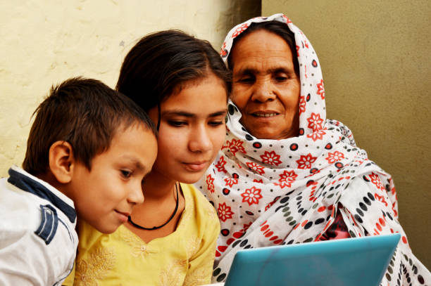 istock Family using laptop at home 1037377134