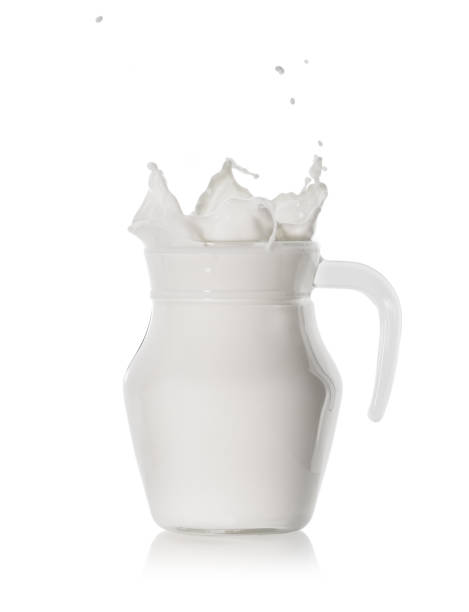 istock Milk in a glass jug with a handle 1037379100