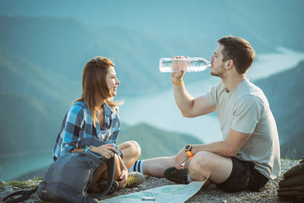 istock Hiking couple with map 1037384560