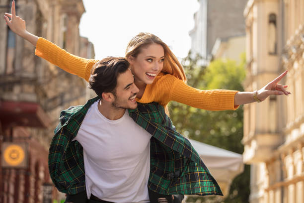 istock Smiling young couple having fun together. 1037391522