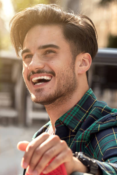 bel giovanotto con il sorriso. - toothy smile relaxation white healthcare and medicine foto e immagini stock