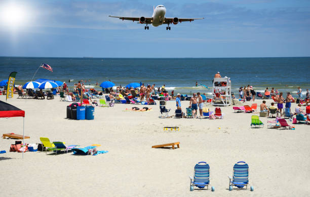 istock Airplane landing for the holidays beach 1037399724
