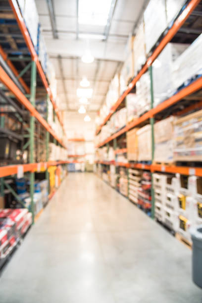 istock Blurry background huge warehouse at wholesale store in America 1037411186