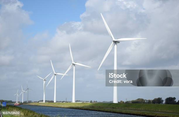 Wind Turbines In Holland Stock Photo - Download Image Now - Alkmaar, Canal, Environment