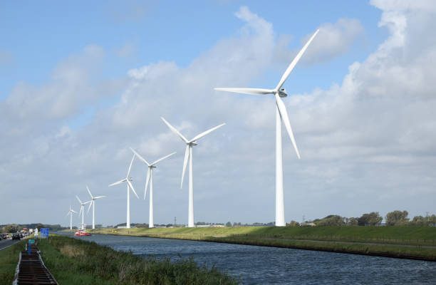 Wind turbines in Holland Wind turbines in Holland kanal stock pictures, royalty-free photos & images