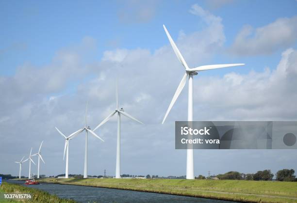 Wind Turbines In Holland Stock Photo - Download Image Now - Alkmaar, Canal, Environment