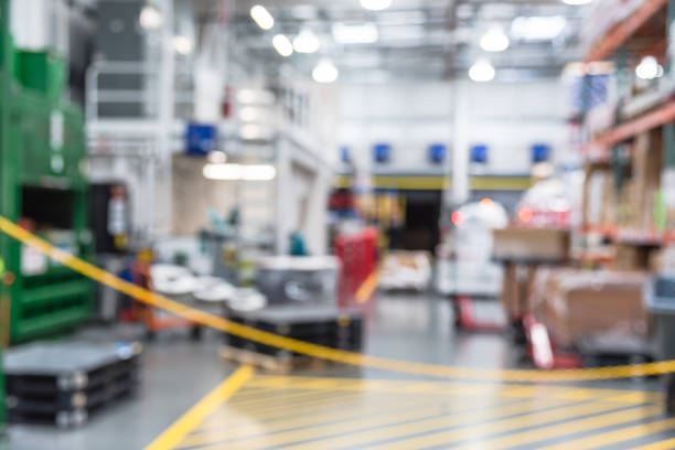 istock Blurry background worker stack goods on forklifts at wholesale store in America 1037416316