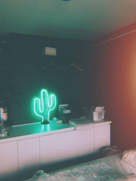 Cozy bedroom details Photo of a details in a cosy loft apartment bedroom // mobile stock photo taken on iPhone 8 neon bedroom stock pictures, royalty-free photos & images