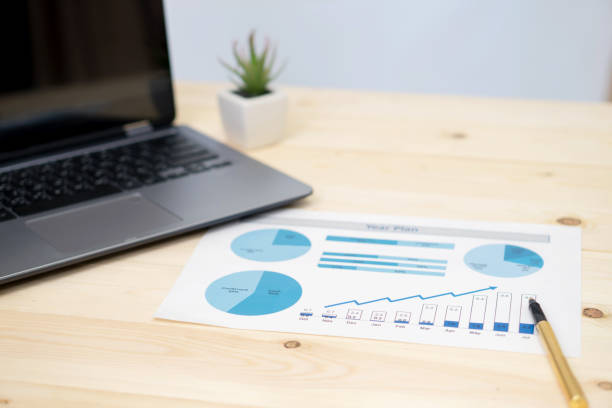 istock Laptop and document on the office desk 1037432928