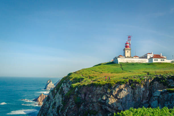 istock Cabo da Roca, Portugal. Lighthouse and cliffs over Atlantic Ocean, the most westerly point of the European mainland. 1037435404