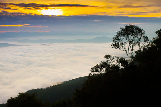 istock landscape view of sunrise above mountain with cloud 1037441118