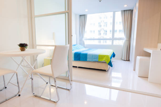istock Modern condominium living room and bedroom 1037444774