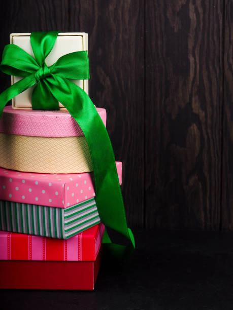 istock Christmas gift box. presents in front of a festive background. 1037461396