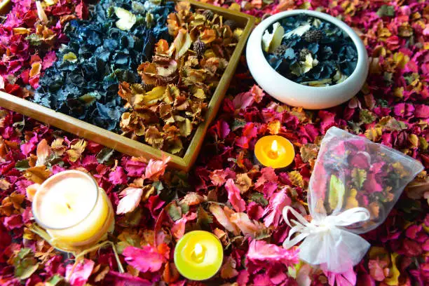 Potpourri or dried petals flowers colorful and scented candles