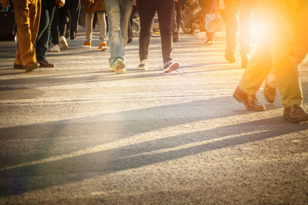 istock Pedestrains crossing street 1037469272