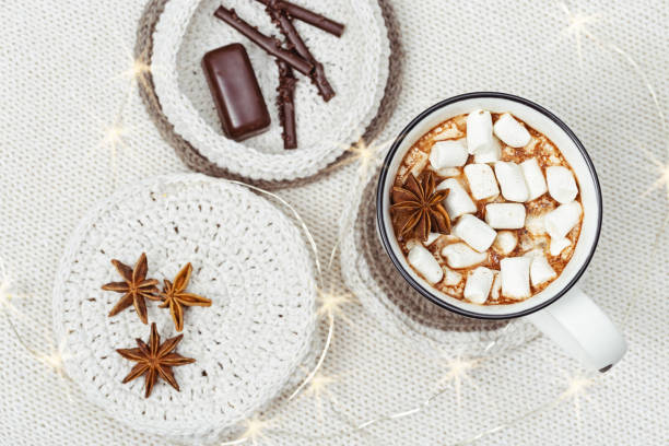 istock Hot chocolate with marshmallows and chocolate sticks, chocolate candy, star anise 1037476210