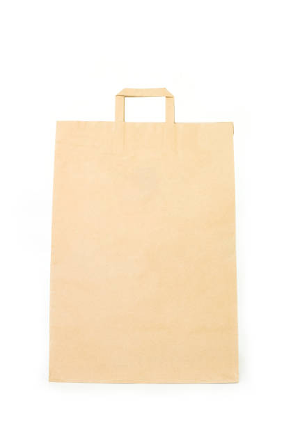istock brown paper bag on white background. 1037488252