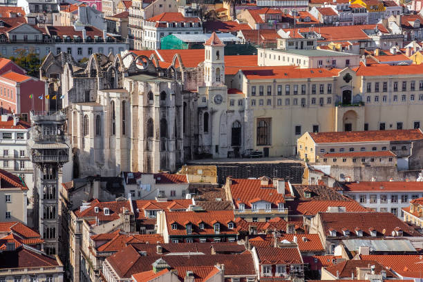 istock Carmo Convent ruins, Santa Justa lift or Elevator and orange rooftops 1037497034