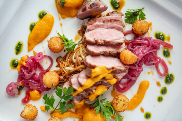 Directly above view of duck meal in restaurant