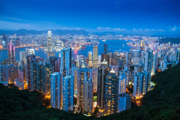 istock Sunset over Victoria Harbor in Hong Kong seen from Peak 1037514010