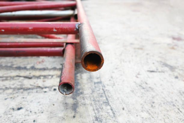 istock Metal pipe stainless stacked in construction area 1037514058
