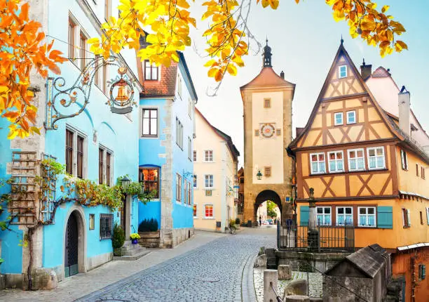 half-timbered houses and city tower of Rothenburg ob der Tauber, Germany at fall