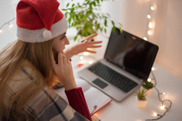istock Cute young woman working freelance at home, talking on smartphone 1037529582