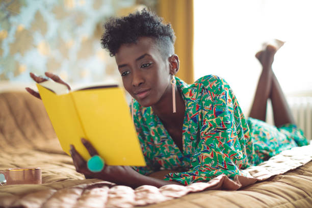 istock Woman is relaxing and reading a book 1037536138
