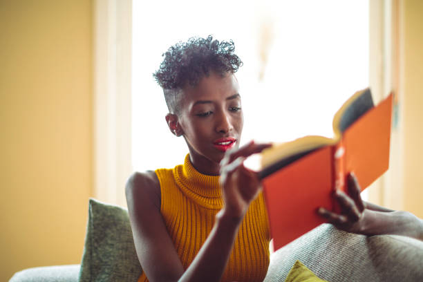 istock Woman is relaxing and reading a book 1037536358