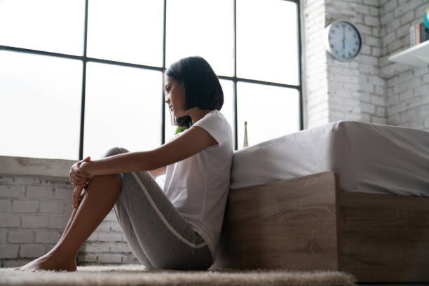 istock Asian women She is alone And feel lonely 1037536436