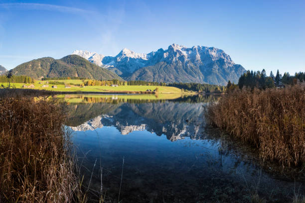 istock Autumn at Alpine Lake Schmalensee- view to mount Karwendel, Garmisch Partenkirchen, Alps 1037550708