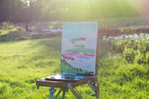 istock Started etude oil on the easel in the botanical garden 1037563550