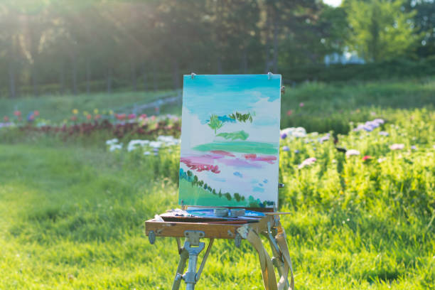 istock Started etude oil on the easel in the botanical garden 1037566610