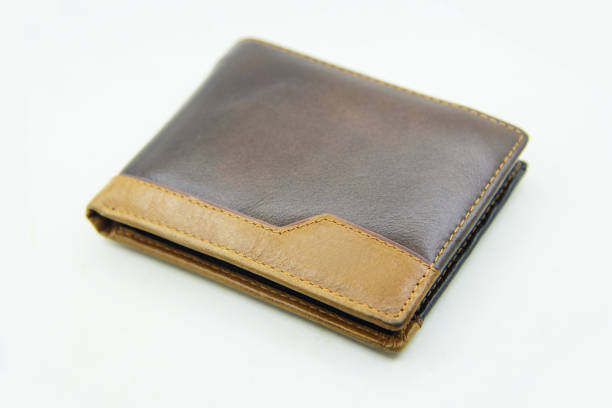 istock Brown leather wallet with money 1037572542