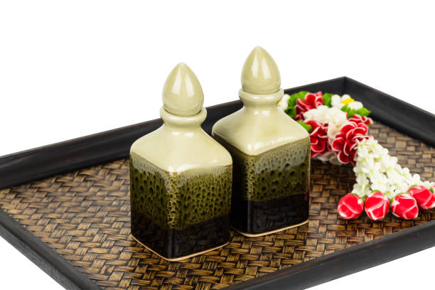 Ceramic massage oil bottle omn tray for spa treatment