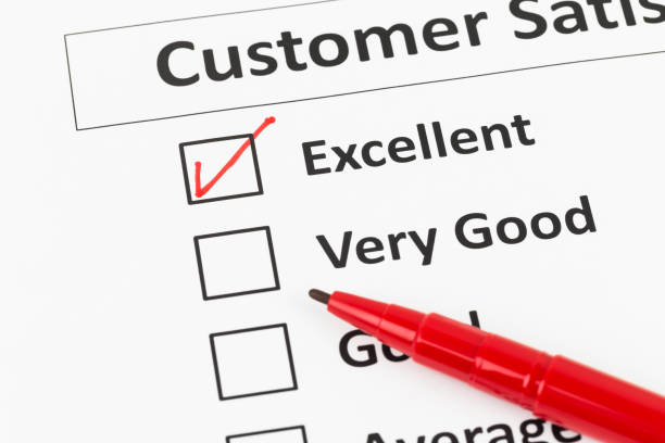 istock Customer satisfaction survey checkbox and pen with excellent tick 1037577304