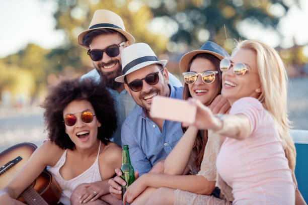 istock Friends having fun on the beach 1037581782