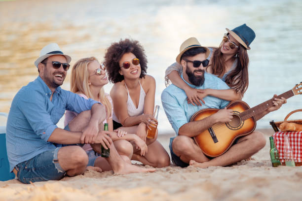 istock Friends having fun on the beach 1037582096