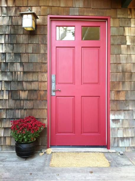 istock Red Door with Red Flowers 1037585908