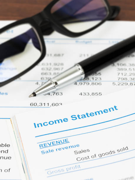istock Income statement in stockholder report book; statement is mock-up 1037591940