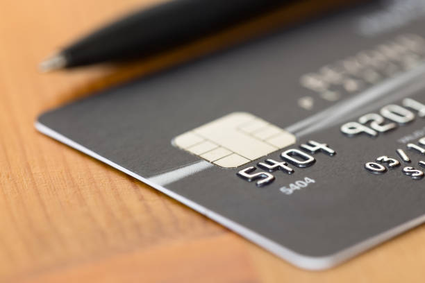 istock Pen on black credit card 1037592130