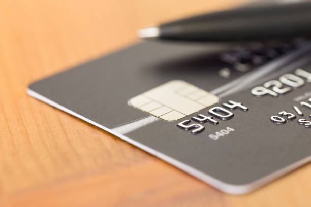 istock Pen on black credit card 1037592132