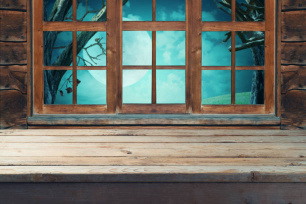 istock Empty wooden table over wooden window background. 1037604602