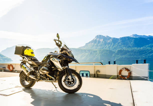 BMW Enduro Motorrad on a ferry on Lake Lucerne, travel and adventure, Switzerland stock photo